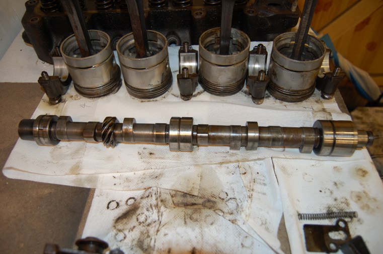 The camshaft was 1/2 race and as can be seen, has no machined end to take the rev counter drive. The condition of the cam and followers is good, the engine having only been run for a few thousand miles, however, new followers will be fitted to be sure. Now having doubts on whether or not to go back to a standard camshaft!