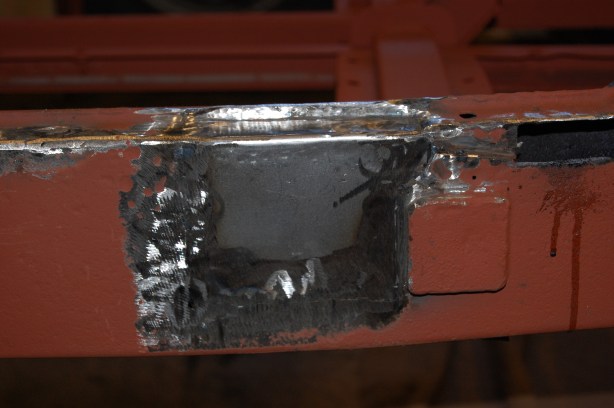 Finished flush repair - other smaller perforations were ground back and filled with weld. Further welding was carried out after this shot, where weld hadn't penetrated sufficiently. One repair section from MGOC is £39.00, so worth the effort.