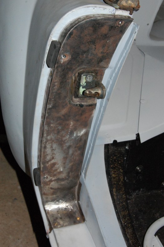 At this stage it's essential to fit the door up with the catch mechanism, the striker and buffer rubbers.The new rubbers were far too big and required cutting and sanding back to fit.