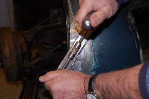 Now using a coarse body file (bought this one at my local second-hand tool shop for £3.00) filing down to a smooth finish. Any obvious low areas were filled again.