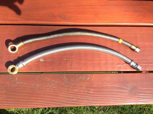 Carburettor feed pipes. The top one is the original Smiths pipe as supplied with the car when new. It wrankles that I can't risk re using it, due to the age of the rubber pipe inside the brading and also the damage modern fuels will do. The lower pipe is the Moss Europe supplied pipe which is a greater in diameter and much chunkier looking. Unfortunately. as far as I know, there is no other option available that is nearer to the original.