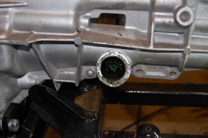 Access to pinion is via a metal plug on the opposite side of the extension.